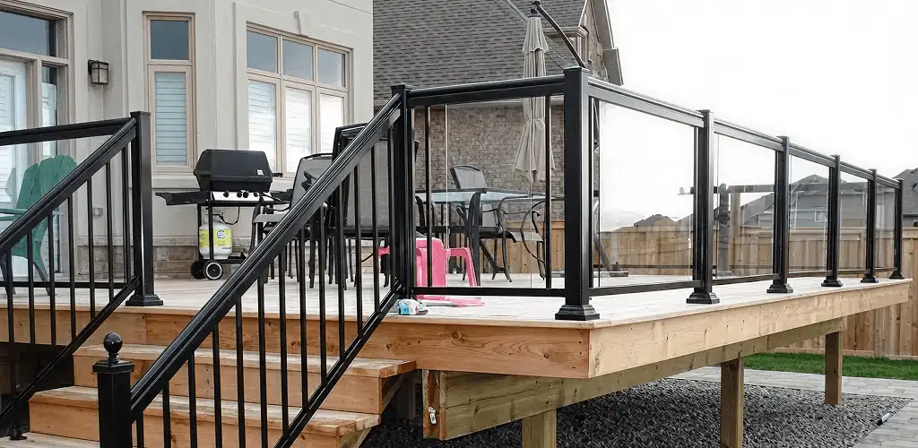 Handrail installation on a deck staircase for safety and code compliance in Bradenton, FL